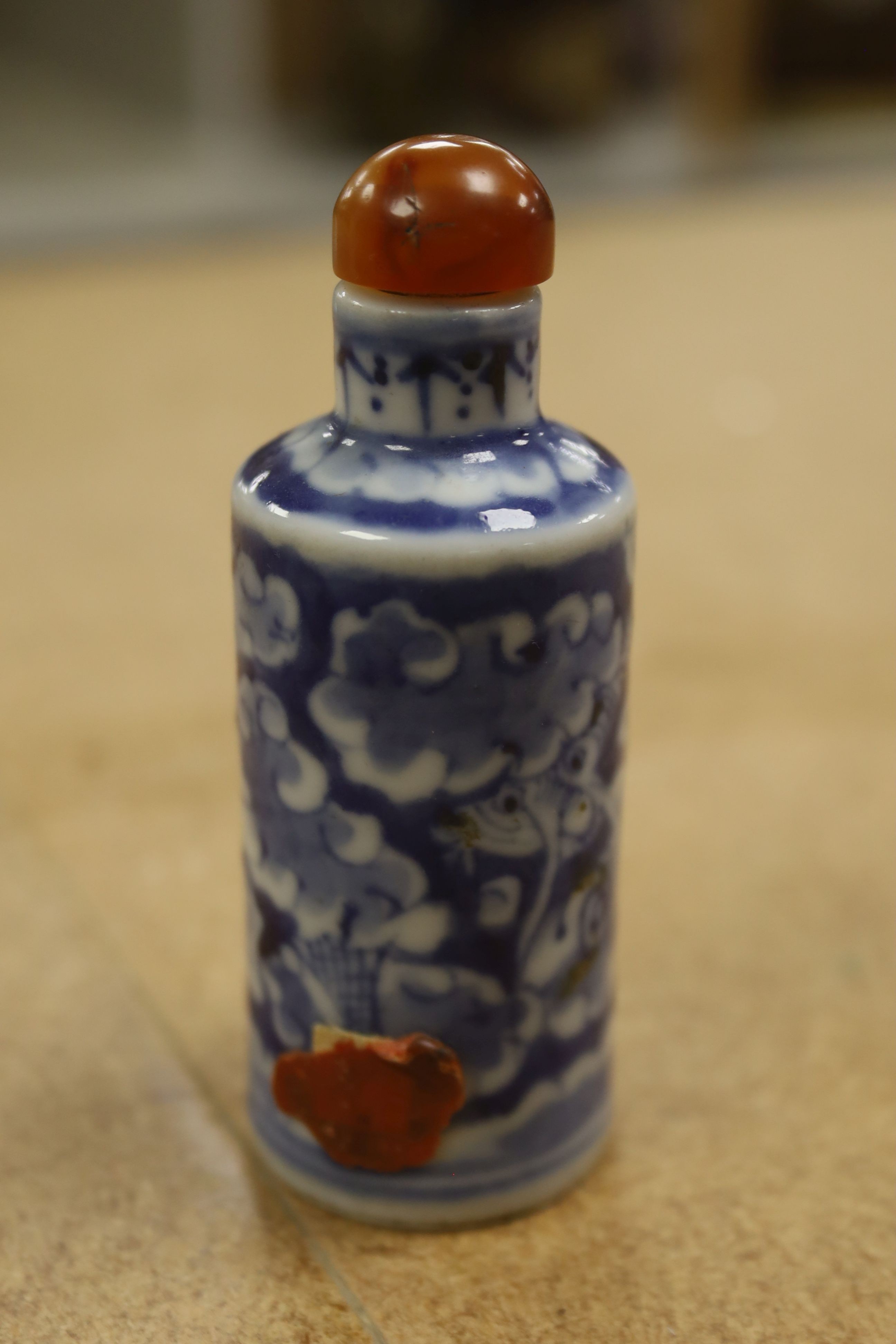 A Chinese blue and white snuff bottle, 9cm high including stopper